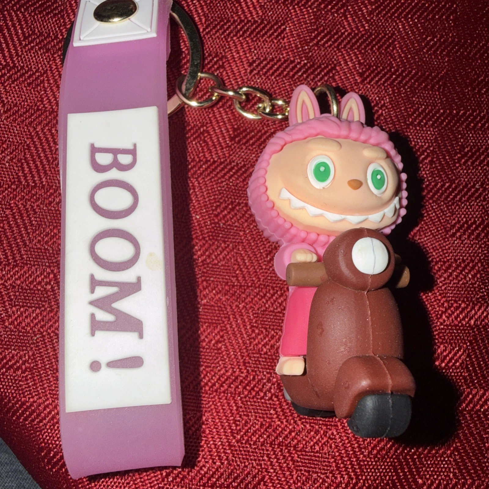 PINK LABUBU on scooter ￼KEYCHAIN, OR BAG CHARM w/ SILICONE STRAP